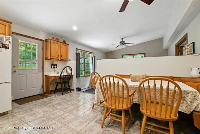 104 Sturbridge Rd, Clarks Summit, PA 18411 - dining area with a ceiling fan, lofted ceiling, and light tile patterned floors