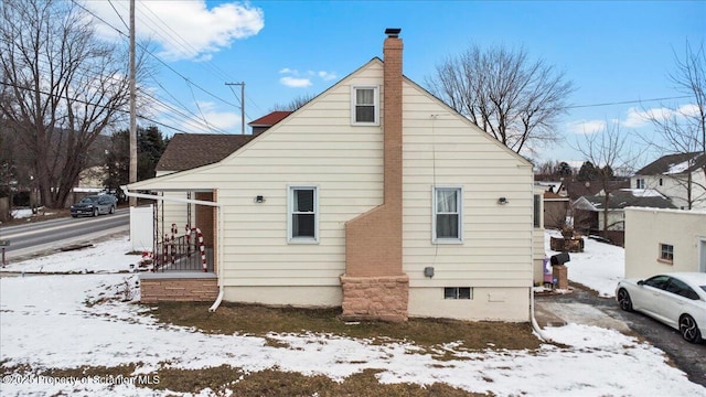 view of snow covered property