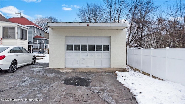 view of snow covered garage