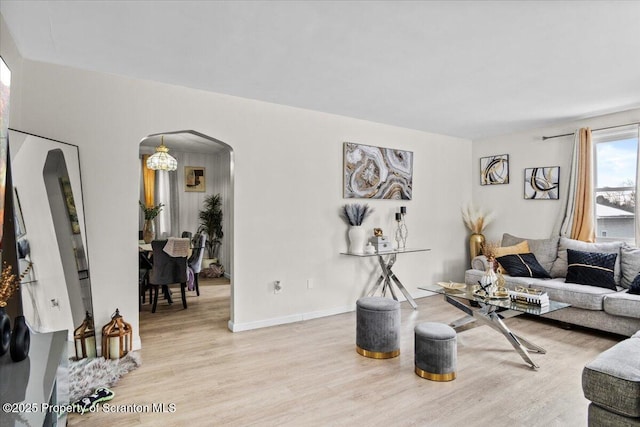 living room with light hardwood / wood-style floors