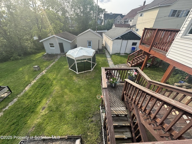 1008 Crown Ave, Scranton, PA 18505 - view of grassy yard with a wooden deck, stairs, and an outbuilding