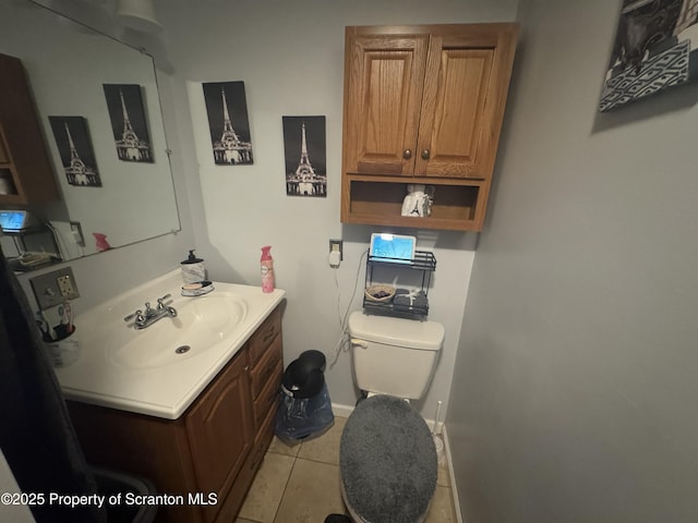 1008 Crown Ave, Scranton, PA 18505 - half bath featuring vanity, toilet, tile patterned flooring, and baseboards