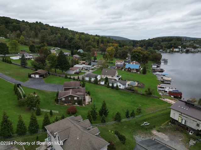 bird's eye view with a water view