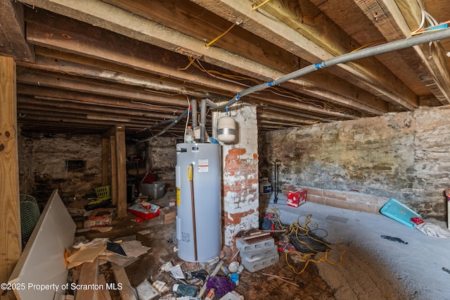 unfinished below grade area featuring water heater