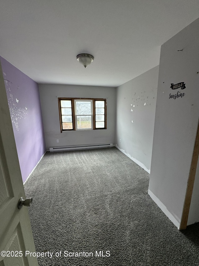 unfurnished room featuring carpet, baseboards, and baseboard heating