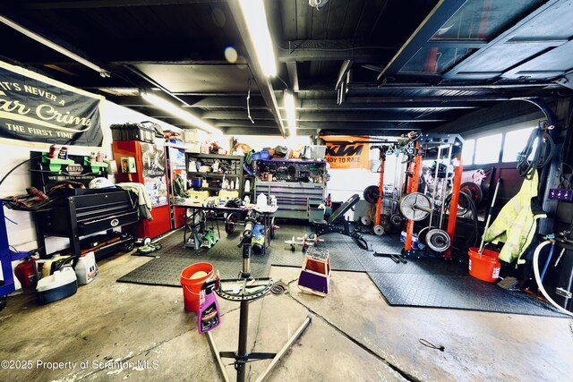 garage with a workshop area