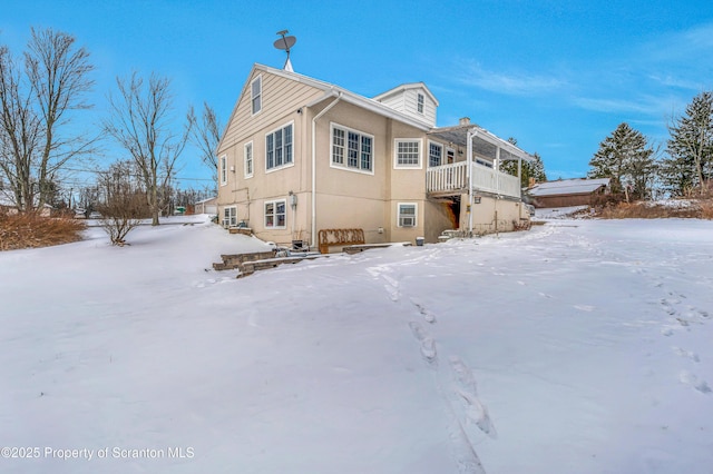 view of snow covered property