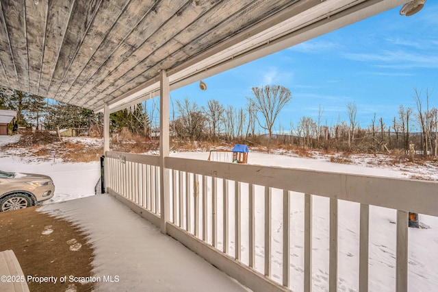 view of snow covered patio