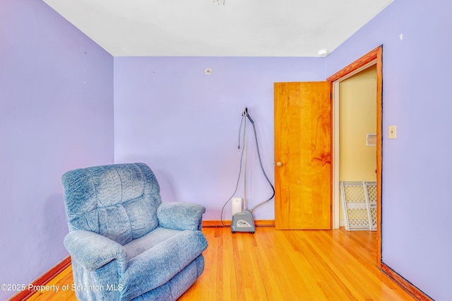 living area featuring hardwood / wood-style flooring