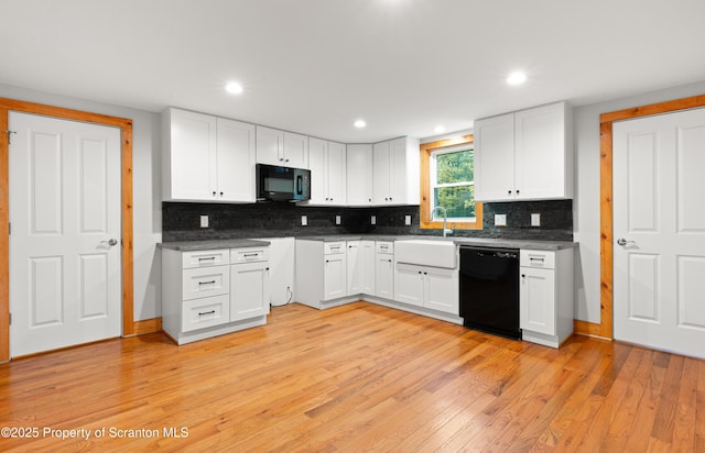 87 Old Farm Ln, White Haven, PA 18661 - kitchen featuring black appliances, a sink, light wood-type flooring, white cabinets, and recessed lighting