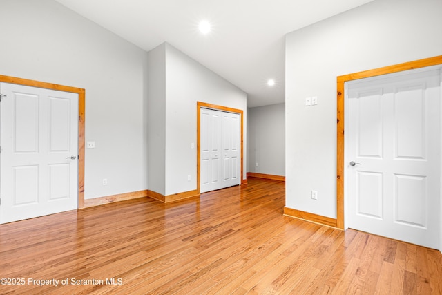 87 Old Farm Ln, White Haven, PA 18661 - unfurnished bedroom with lofted ceiling, light wood-style flooring, baseboards, and recessed lighting