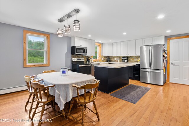 87 Old Farm Ln, White Haven, PA 18661 - kitchen with appliances with stainless steel finishes, plenty of natural light, light countertops, backsplash, and recessed lighting