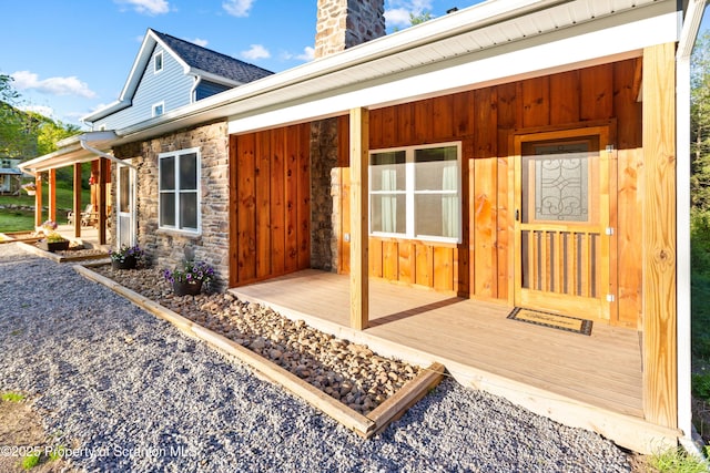 87 Old Farm Ln, White Haven, PA 18661 - entrance to property featuring stone siding, a chimney, and a porch
