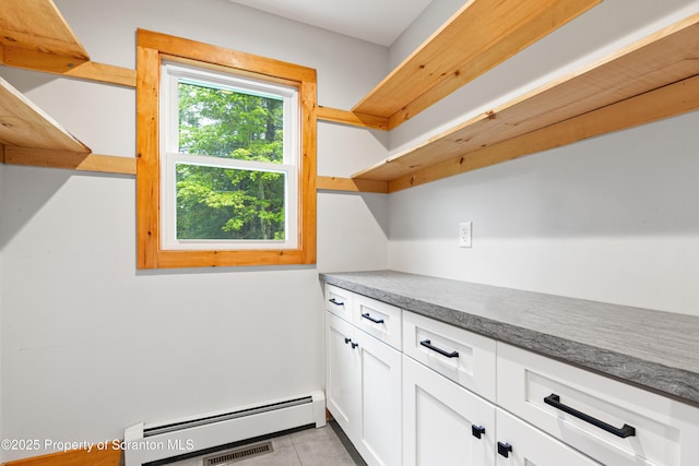 87 Old Farm Ln, White Haven, PA 18661 - bar with light tile patterned flooring and baseboard heating