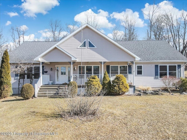 view of front of house featuring a porch and a front yard