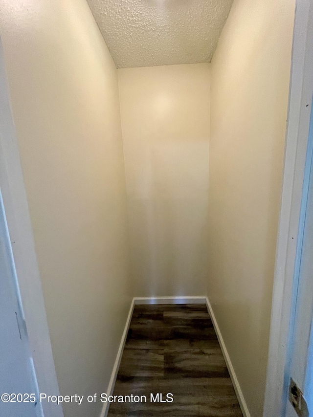 1211 Jackson St 1209-, Scranton, PA 18504 - detailed view of baseboards, wood finished floors, and a textured ceiling