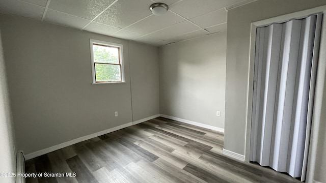 1211 Jackson St 1209-, Scranton, PA 18504 - unfurnished room with a paneled ceiling, baseboards, and wood finished floors