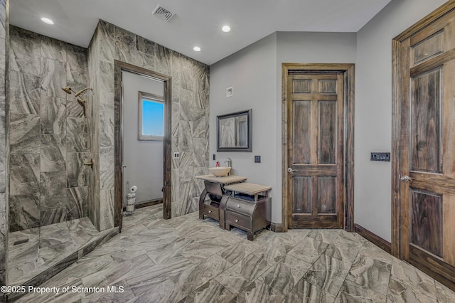 815 Oak St, Archbald, PA 18403 - bathroom featuring vanity, visible vents, recessed lighting, a tile shower, and marble finish floor