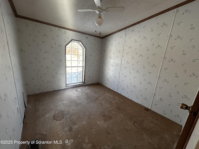 empty room featuring wallpapered walls, crown molding, a textured ceiling, and ceiling fan