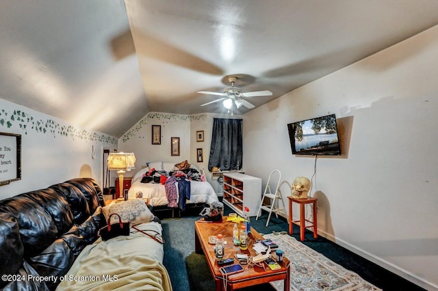 living room featuring ceiling fan, carpet floors, and vaulted ceiling