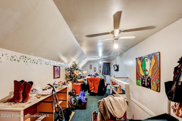 interior space featuring vaulted ceiling and ceiling fan