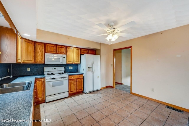 kitchen with backsplash, white appliances, ceiling fan, sink, and light tile patterned floors