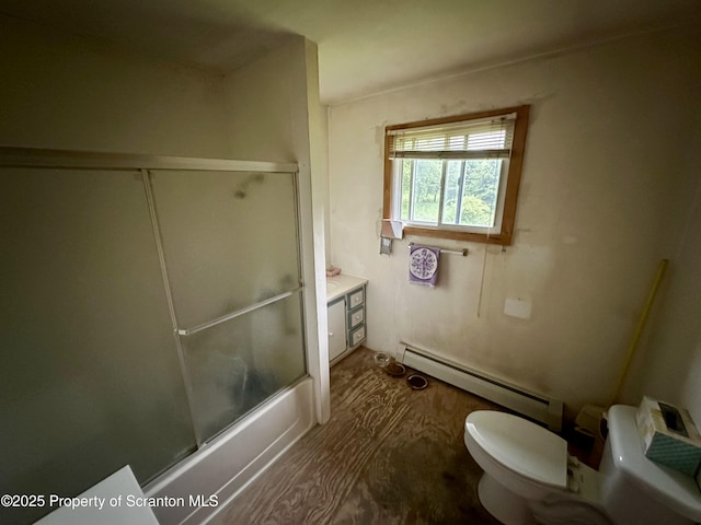 328 Stanek Rd, Meshoppen, PA 18630 - bathroom featuring a baseboard heating unit, toilet, wood finished floors, and enclosed tub / shower combo
