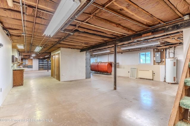 474 Tingley Lake Rd, New Milford, PA 18834 - basement featuring heating fuel, gas water heater, and electric panel