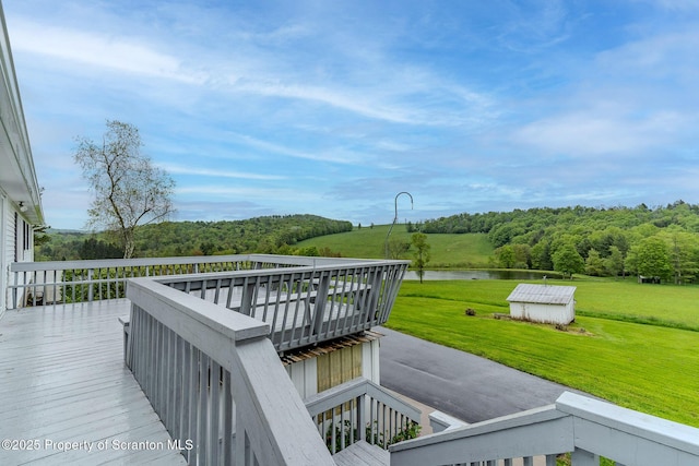474 Tingley Lake Rd, New Milford, PA 18834 - wooden terrace featuring a lawn and a water view