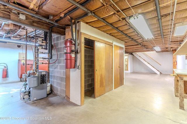 474 Tingley Lake Rd, New Milford, PA 18834 - unfinished below grade area featuring a central vacuum unit and stairs
