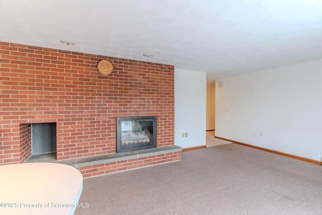 474 Tingley Lake Rd, New Milford, PA 18834 - unfurnished living room with a fireplace, baseboards, and carpet floors