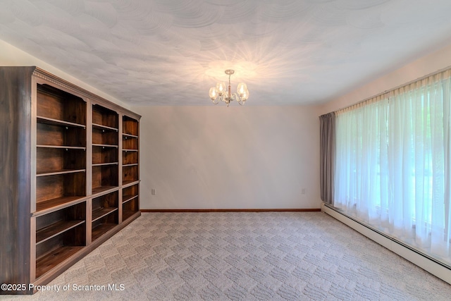 474 Tingley Lake Rd, New Milford, PA 18834 - carpeted empty room with baseboard heating, a chandelier, and baseboards