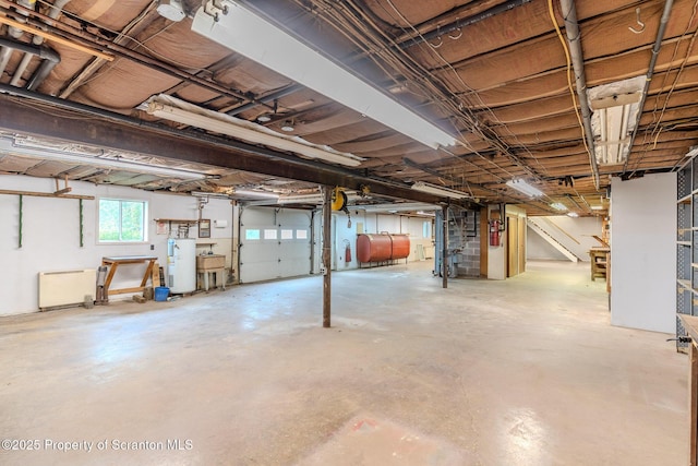 474 Tingley Lake Rd, New Milford, PA 18834 - basement with oil tank and electric water heater