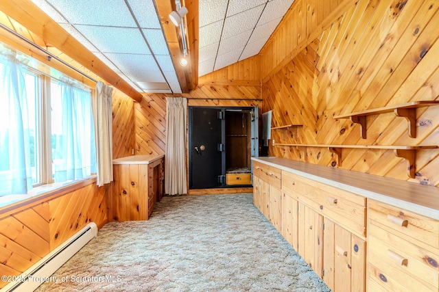 474 Tingley Lake Rd, New Milford, PA 18834 - hall featuring a baseboard heating unit, light carpet, wooden walls, and lofted ceiling