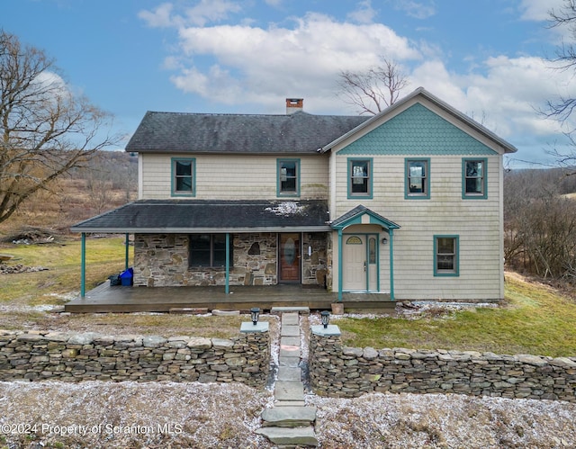 view of front of property featuring covered porch