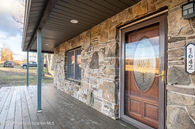 entrance to property with covered porch