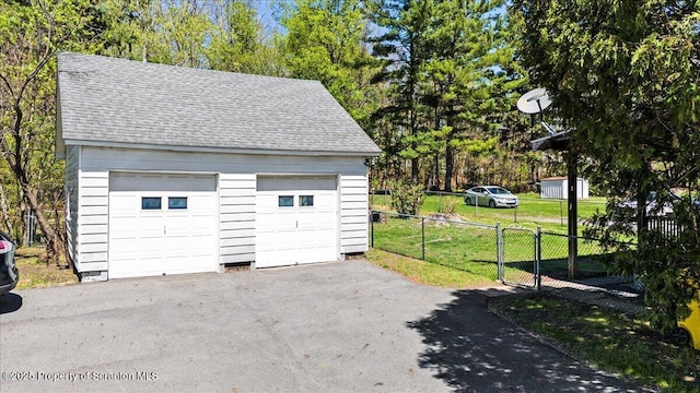 detached garage with fence