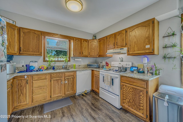 119121 Fern Way S, Abington Twp, PA 18411 - kitchen featuring white appliances, under cabinet range hood, dark wood-type flooring, brown cabinets, and light stone countertops
