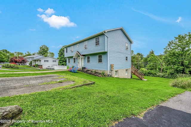 119121 Fern Way S, Abington Twp, PA 18411 - view of front of house with a front lawn, stairs, and driveway