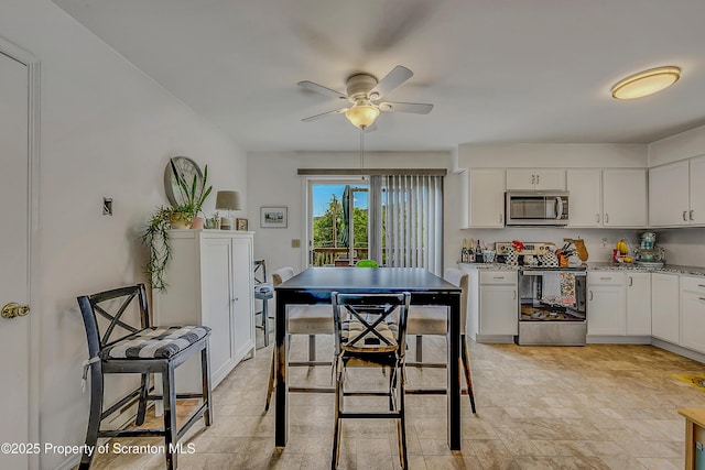 119121 Fern Way S, Abington Twp, PA 18411 - dining room featuring a ceiling fan and light stone finish floors