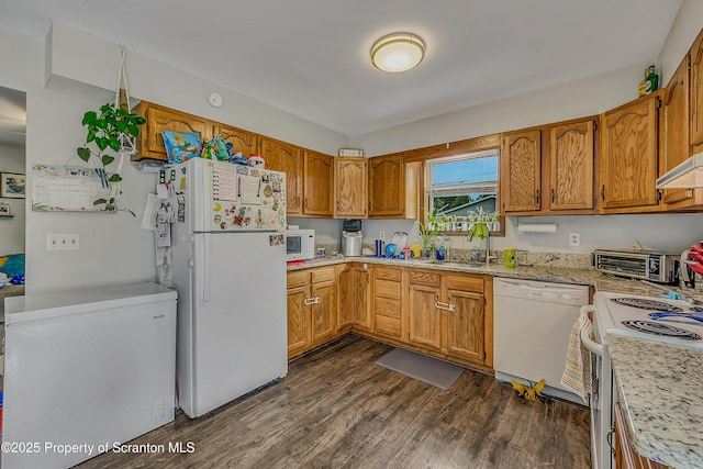 119121 Fern Way S, Abington Twp, PA 18411 - kitchen with white appliances, dark wood-type flooring, brown cabinets, and under cabinet range hood