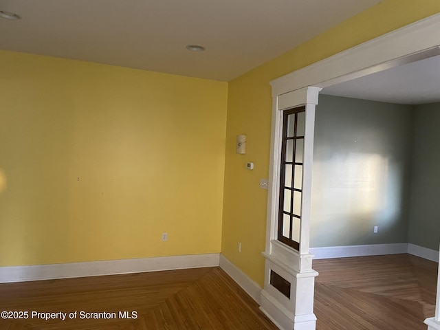 spare room with parquet flooring