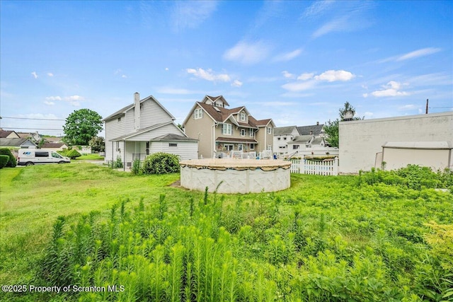 205 Lackawanna Ave, Duryea, PA 18642 - rear view of house with a covered pool and a residential view