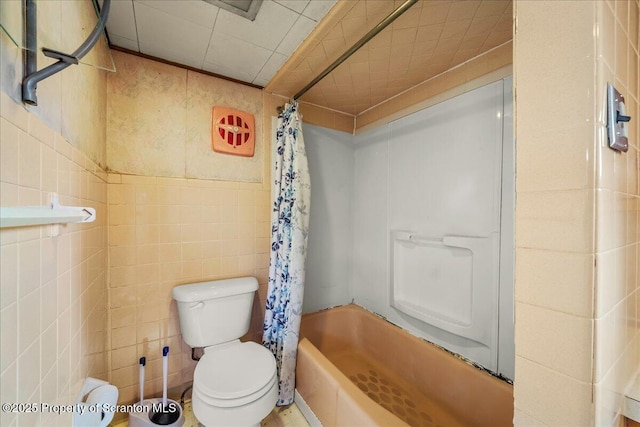 205 Lackawanna Ave, Duryea, PA 18642 - full bathroom featuring shower / bath combo with shower curtain and tile walls