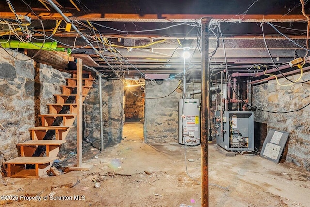 205 Lackawanna Ave, Duryea, PA 18642 - unfinished below grade area with water heater and a heating unit