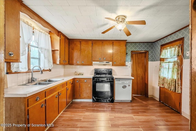 205 Lackawanna Ave, Duryea, PA 18642 - kitchen with black range with gas cooktop, dishwasher, under cabinet range hood, a ceiling fan, and healthy amount of natural light