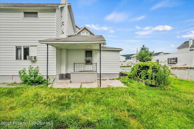 205 Lackawanna Ave, Duryea, PA 18642 - rear view of property with a yard and a shingled roof