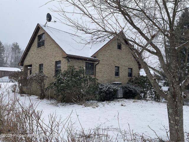 view of snow covered property