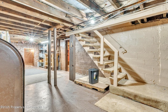 50 Humphrey St Unit 50-51, Old Forge, PA 18518 - unfinished below grade area featuring stairway and oil tank