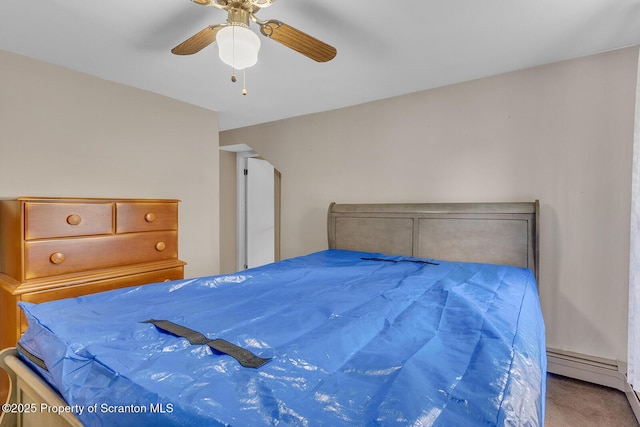 50 Humphrey St Unit 50-51, Old Forge, PA 18518 - carpeted bedroom with a baseboard radiator and a ceiling fan